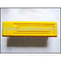 yellow plastic block handle brush